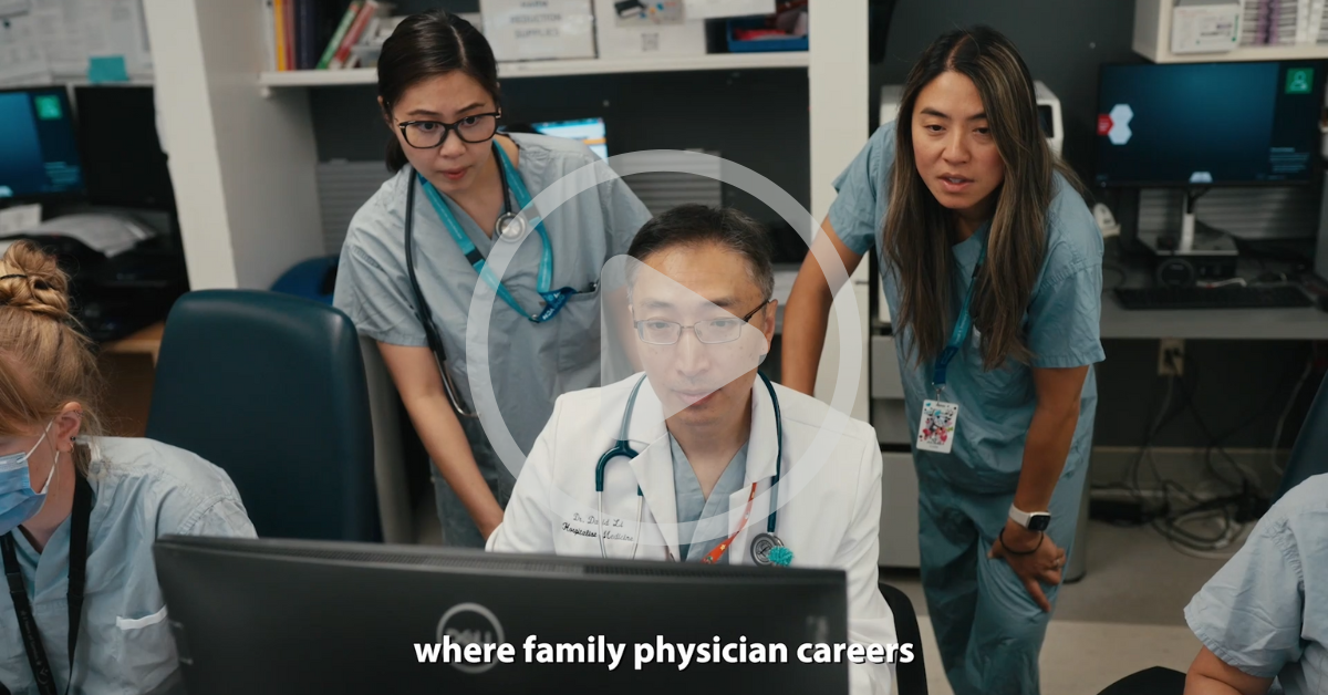 Richmond Family Doctor Recruitment Richmond Family Physician looking at patient records with nurses